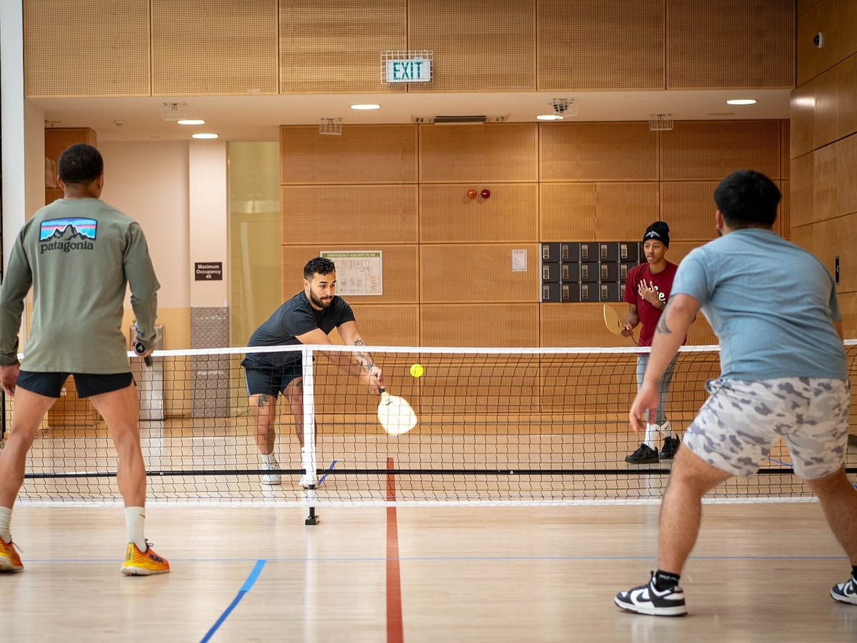 Court shoes planted sideways on a pickleball court